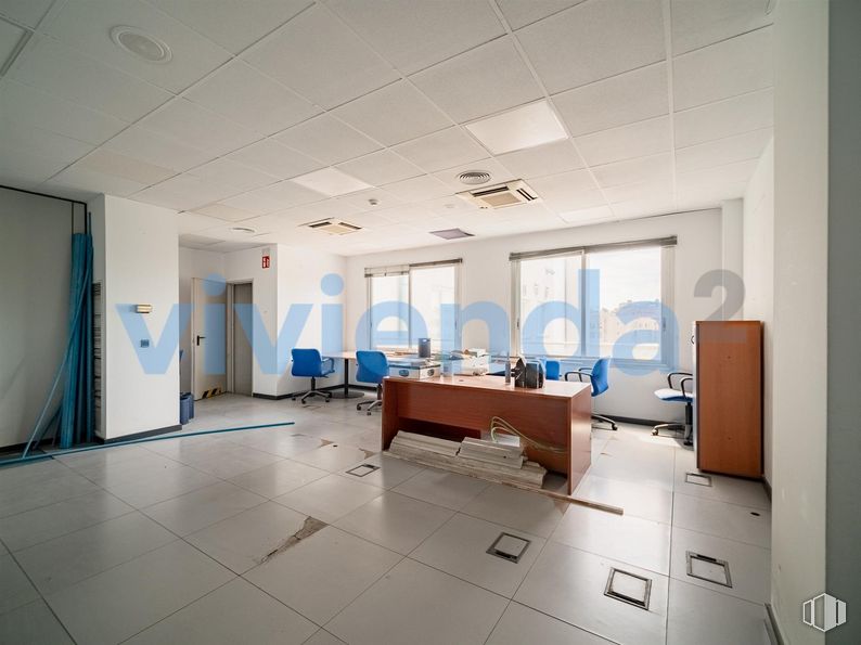 Retail for sale at Calle San Romualdo, San Blas - Canillejas, Madrid, 28037 with desk, furniture, light fixture, window, interior design, flooring, floor, fixture, hall and ceiling around