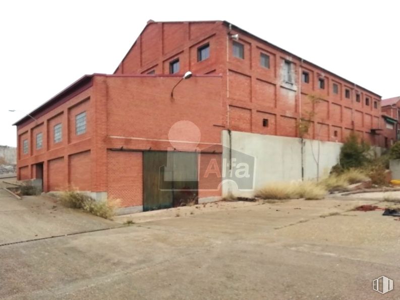 Industrial for sale at Paseo San Cosme, Navalcarnero, Madrid, 28600 with house, sky, window, plant, building, land lot, brick, residential area, facade and real estate around