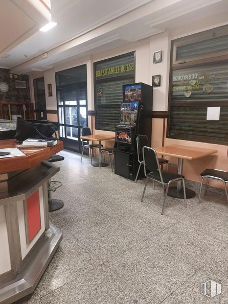 Retail for sale at Calle Doctor Santero, Tetuán, Madrid, 28039 with chair, table, interior design, flooring, floor, television, houseplant, building, hardwood and picture frame around