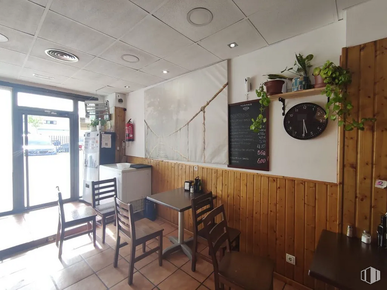 Retail for sale at Avenida Industria, Tres Cantos, Madrid, 28760 with chair, clock, table, property, furniture, plant, houseplant, interior design, building and wood around