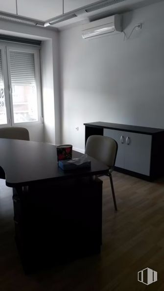 Office for rent at Avenida Gregorio Ruiz, Talavera de la Reina, Toledo, 45600 with window, cabinetry, table top, table, cupboard, furniture, light, lighting, wood and fixture around