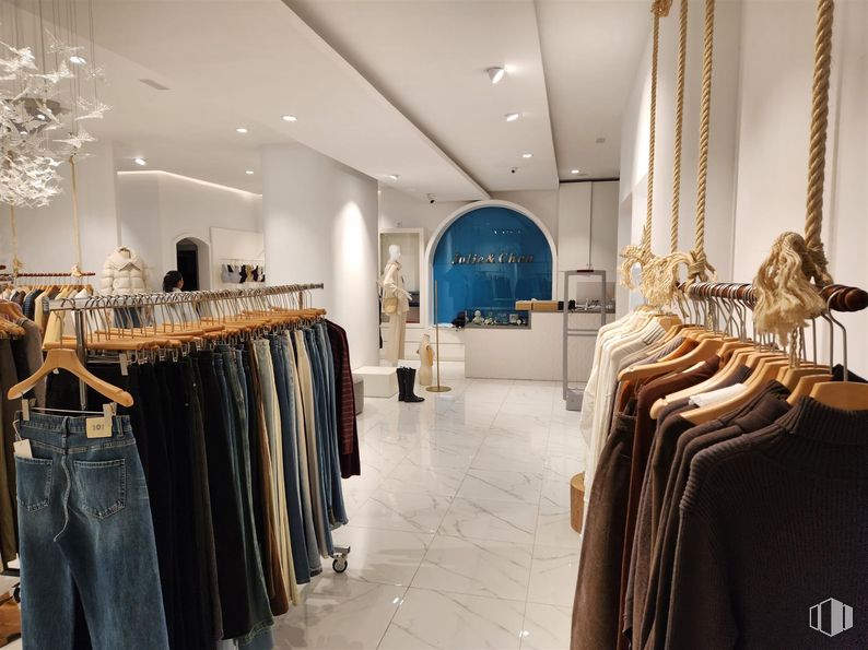 Retail for sale at Zona centro, Villanueva de la Cañada, Madrid, 28691 with jeans, lighting, clothing, chandelier, top, retail, boutique, clothes hanger and display window around