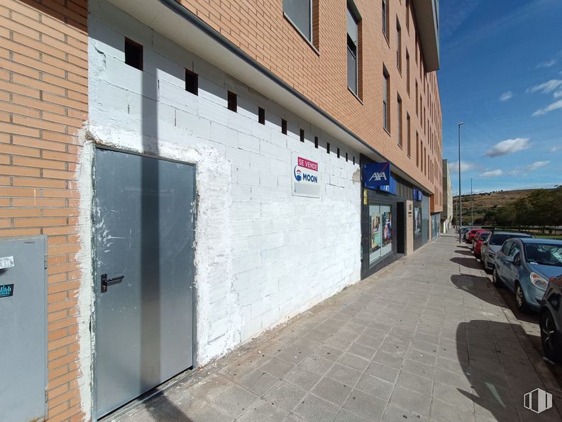 Retail for sale at Bulevar Clara Campoamor, Guadalajara, 19005 with car, building, window, sky, road surface, cloud, asphalt, tire, house and vehicle around