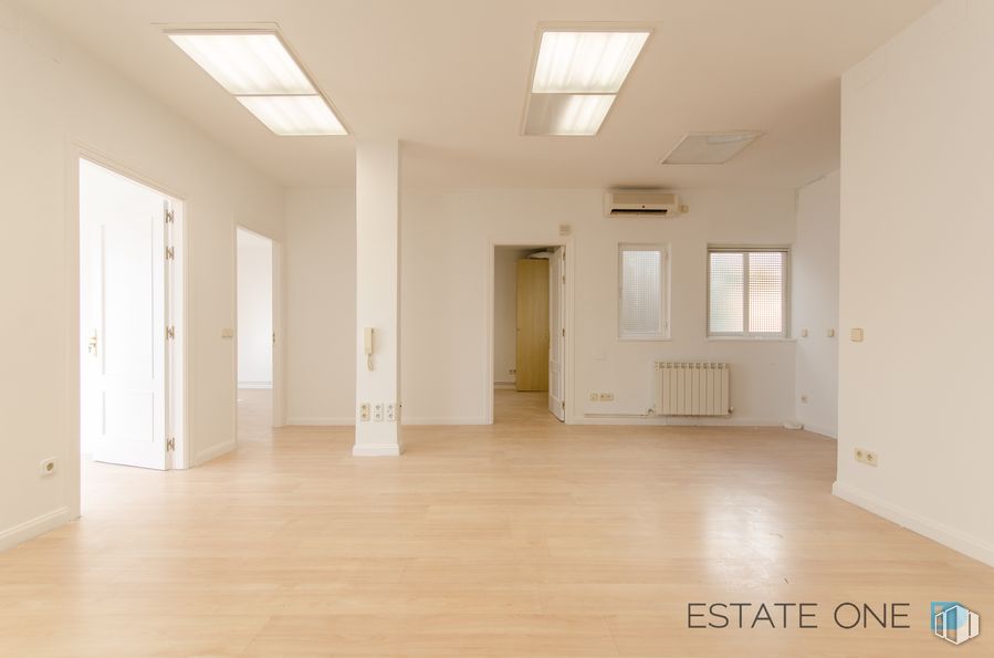 Office for rent at Calle General Oraá, Salamanca, Madrid, 28006 with window, building, fixture, door, wood, hall, interior design, flooring, hardwood and ceiling around