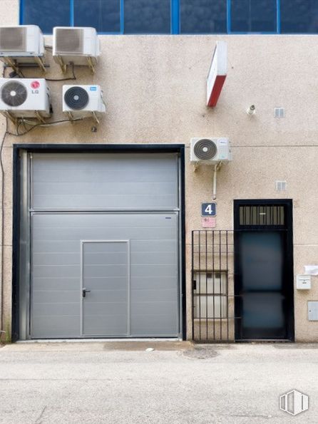 Industrial for sale & for rent at Calle York, Las Rozas de Madrid, Madrid, 28230 with door, fixture, building, wall, wood, gas, road surface, facade, asphalt and audio equipment around