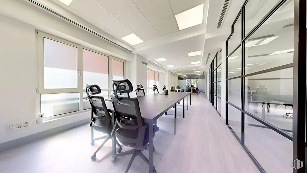 Office for rent at Paseo Castellana, Chamartín, Madrid, 28046 with chair, light fixture, lighting, furniture, table, automotive design, fixture, building, office chair and interior design around