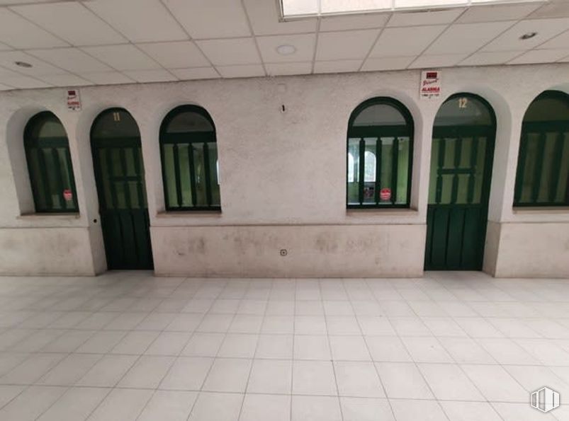 Retail for sale at Calle Atenas, Torres de la Alameda, Madrid, 28813 with door, window, flooring, floor, composite material, concrete, tile, building material, tile flooring and arcade around