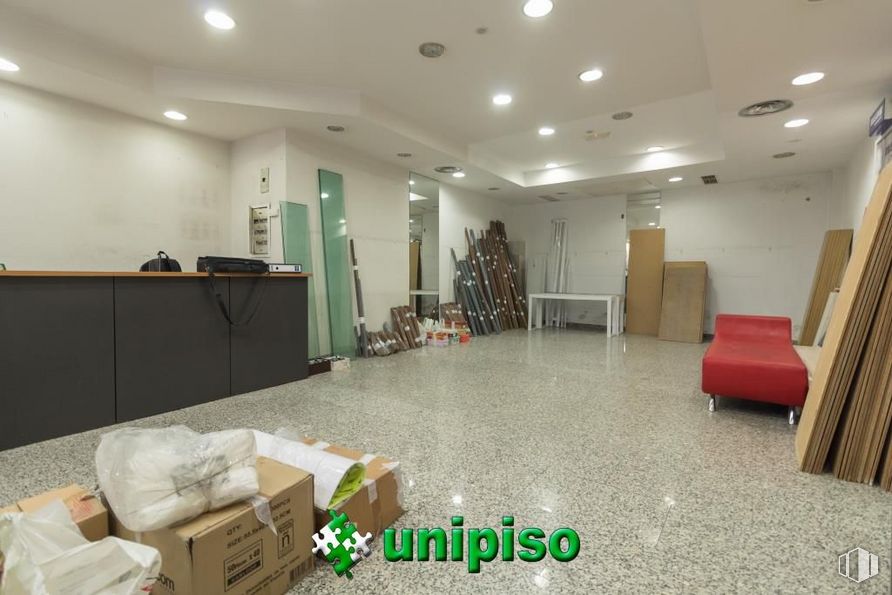 Retail for sale at Zona Salvador, Leganés, Madrid, 28911 with chair, cabinetry, packaged goods, box, furniture, building, lighting, interior design, flooring and floor around