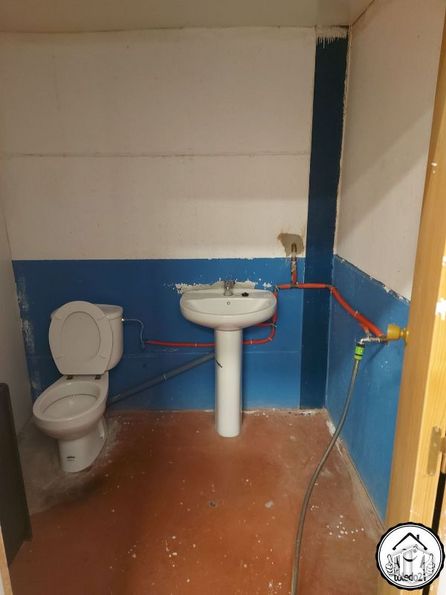 Industrial for sale at Camino Ciempozuelos, Seseña, Toledo, 45224 with toilet, sink, clock, plumbing fixture, bathroom sink, tap, toilet seat, bathroom, purple and fluid around