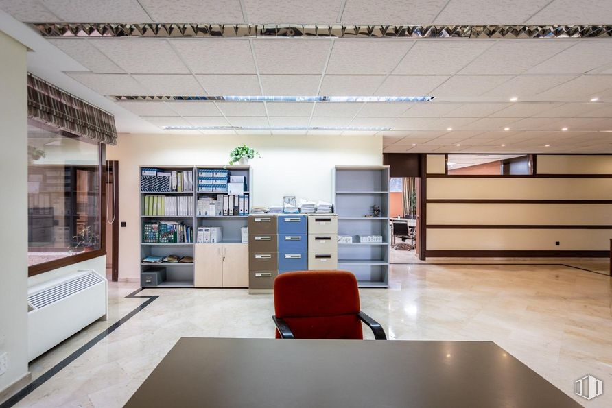 Office for sale at Zona Auditorio, Las Rozas de Madrid, Madrid, 28230 with chair, chest of drawers, bookcase, furniture, interior design, flooring, ceiling, floor, lighting and architecture around