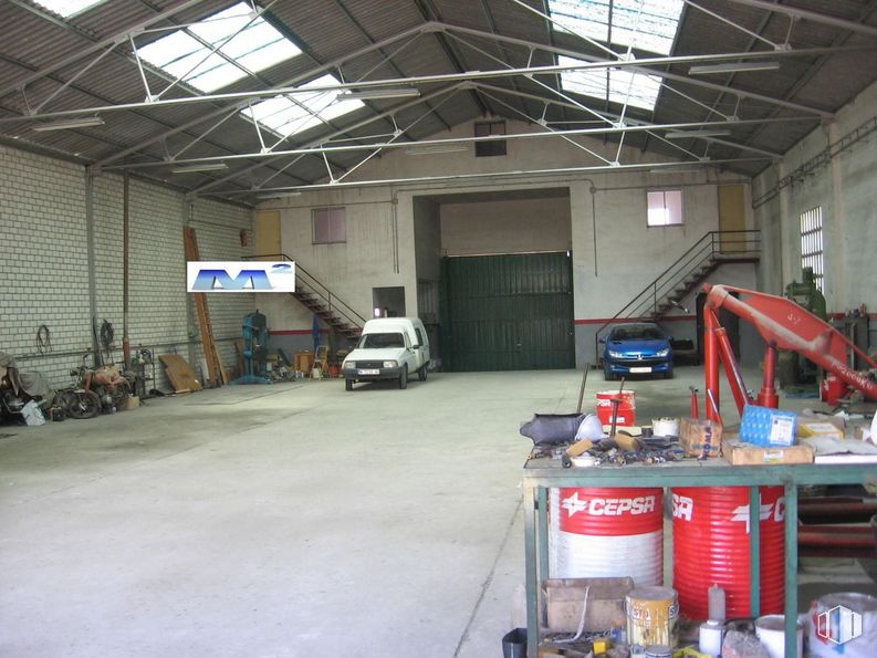 Industrial for sale at Zona Industrial, Cobeña, Madrid, 28863 with car, vehicle, wheel, automotive parking light, motor vehicle, tire, automotive tire, automotive design, floor and building around