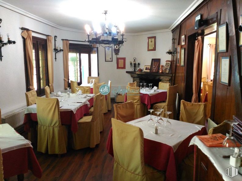 Retail for sale at Valsaín - San Ildefonso - La Granja, San Ildefonso, Segovia, 40109 with lighting, chair, table, cabinetry, furniture, picture frame, interior design, tablecloth, wood and floor around