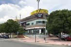 Retail for rent at Centro El Portachuelo, Colmenar Viejo, Madrid, 28770 with car, building, sky, cloud, wheel, tree, tire, vehicle, plant and street light around