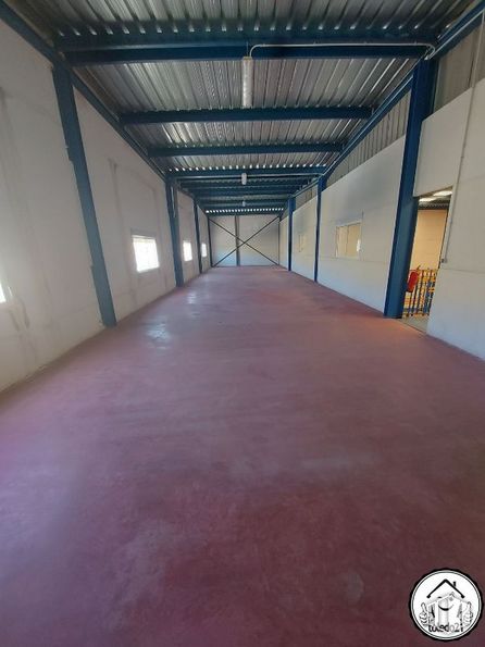 Industrial for sale at Camino Ciempozuelos, Seseña, Toledo, 45224 with fixture, floor, building, flooring, wall, hall, wood, symmetry, shade and space around