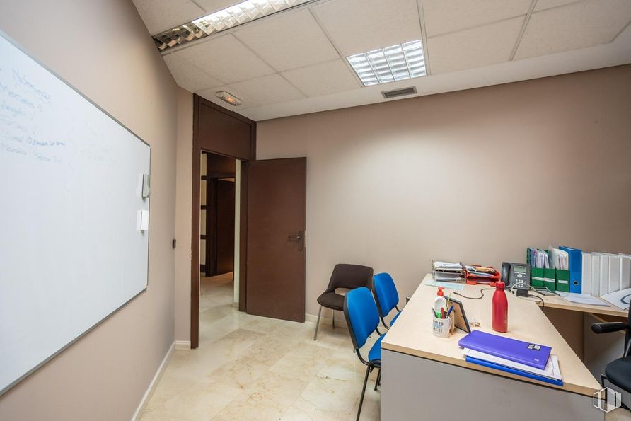 Office for sale at Zona Auditorio, Las Rozas de Madrid, Madrid, 28230 with whiteboard, door, chair, light fixture, desk, lighting, furniture, interior design, flooring and ceiling around