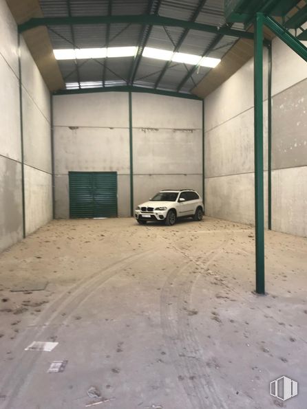 Industrial for sale at Calle Costa del Sol, Yuncos, Toledo, 45210 with car, door, floor, flooring, garage, concrete, building material, parking, daylighting and garage door around