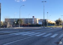 Industrial for rent at SEGRO Park Coslada I, Zona industrial , Coslada, Madrid, 28820 with street light, building, sky, road surface, asphalt, tree, urban design, thoroughfare, residential area and sidewalk around