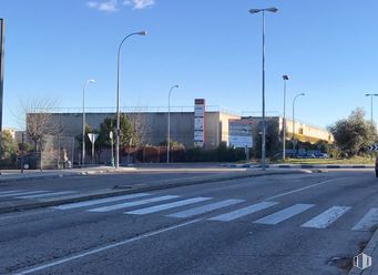 Industrial for rent at SEGRO Park Coslada I, Zona industrial , Coslada, Madrid, 28820 with street light, building, sky, road surface, asphalt, tree, urban design, thoroughfare, residential area and sidewalk around