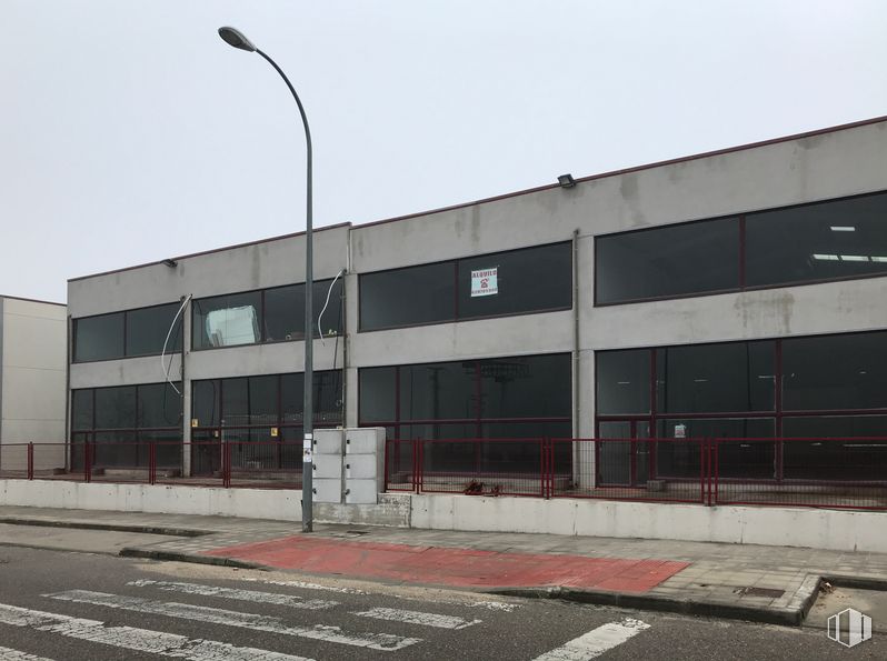 Industrial for sale at Polígono Industrial Puerta de Madrid, Casarrubuelos, Madrid, 28978 with building, street light, sky, asphalt, road surface, urban design, facade, parking, commercial building and city around