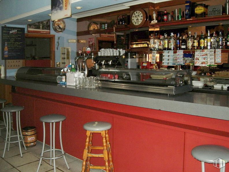 Retail for sale at Carretera Burgohondo, Ávila, 05002 with stool, drinking establishment, bottle, barware, bar stool, countertop, interior design, shelf, drink and drinkware around