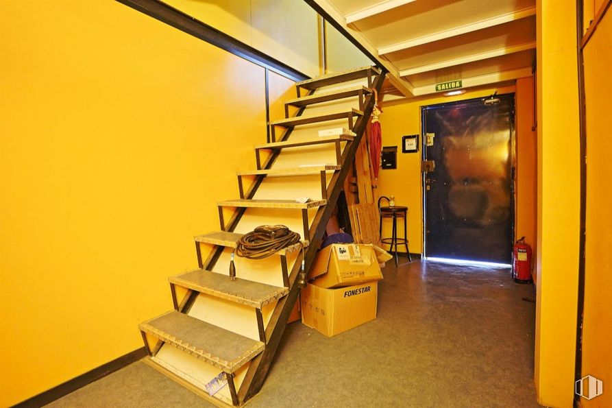 Retail for sale at Zona Puerta del Ángel, La Latina, Madrid, 28011 with packaged goods, wood, interior design, yellow, fixture, stairs, flooring, bookcase, ceiling and building around