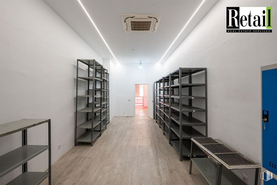 Retail for sale & for rent at Calle Alberto Aguilera, 48, Chamberí, Madrid, 28015 with bookcase, furniture, door, shelf, shelving, flooring, floor, wall, interior design and ceiling around