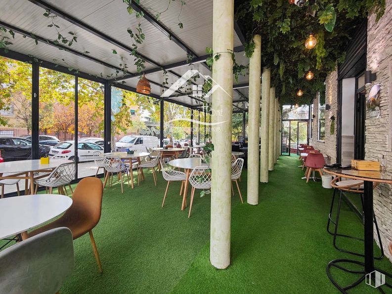 Retail for sale & for rent at Zona Portazgo, Puente de Vallecas, Madrid, 28038 with car, chair, restaurant, shade, design, outdoor furniture and outdoor table around