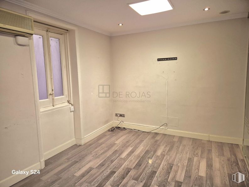 Office for rent at Calle Serrano, Salamanca, Madrid, 28006 with light fixture, window, lighting, flooring, floor, wood, wood flooring, interior design, laminate flooring and apartment around