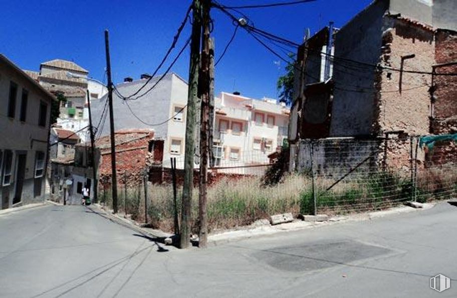 Land for sale at Ronda Matadero, Noblejas, Toledo, 45350 with building, house, plant, sky, window, road surface, slope, electricity, residential area and asphalt around