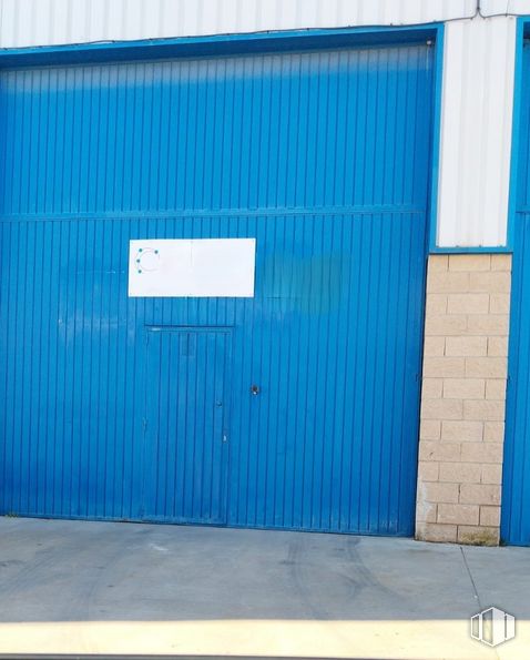 Industrial for rent at Calle Fresadores, Camarma de Esteruelas, Madrid, 28816 with door, blue, wood, rectangle, fixture, aqua, asphalt, composite material, tints and shades and facade around