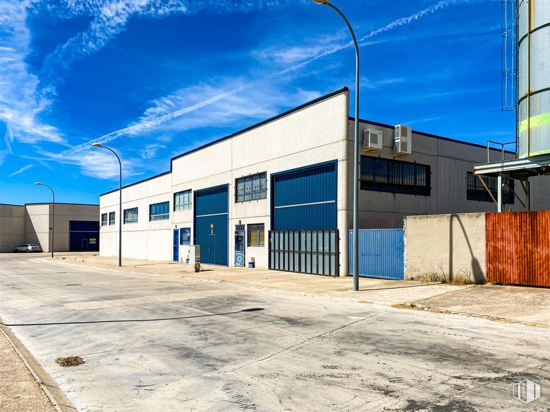 Industrial for sale at Avenida Industria, El Viso de San Juan, Toledo, 45215 with building, window, street light, sky, cloud, property, asphalt, road surface, wood and residential area around