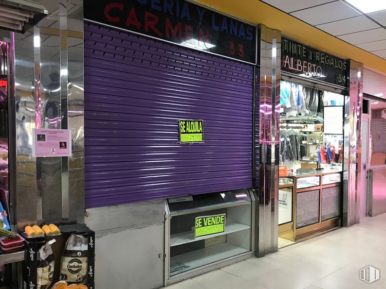 Retail for sale at Calle del Doctor Morcillo, 1, Coslada, Madrid, 28820 with packaged goods, furniture, purple, retail, machine, facade, trade, advertising, door and display device around