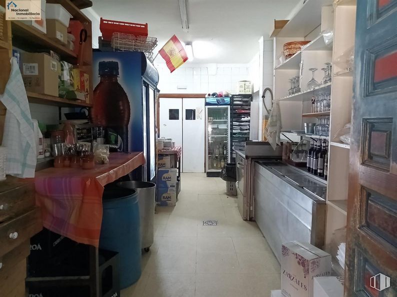 Retail for sale at Zona Collado Hermoso, Collado Hermoso, Segovia, 40170 with shelf, interior design, shelving, cabinetry, table, flooring, building, retail, bottle and ceiling around