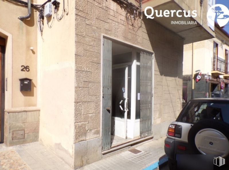 Retail for sale at Calle del Obispo Losana, Segovia, 40005 with car, door, property, vehicle, building, automotive lighting, automotive tail & brake light, automotive design, window and vehicle registration plate around