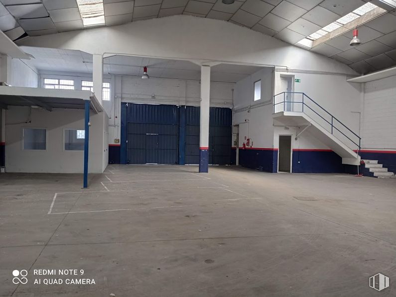 Industrial for rent at Calle Gamonal, 12, Villa de Vallecas, Madrid, 28031 with building, hall, fixture, floor, flooring, parking, gas, ceiling, asphalt and city around