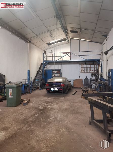 Industrial for sale at Polígono Industrial Miralrío, Velilla de San Antonio, Madrid, 28891 with waste container, car, table, automotive parking light, tire, vehicle, building, motor vehicle, wheel and automotive design around