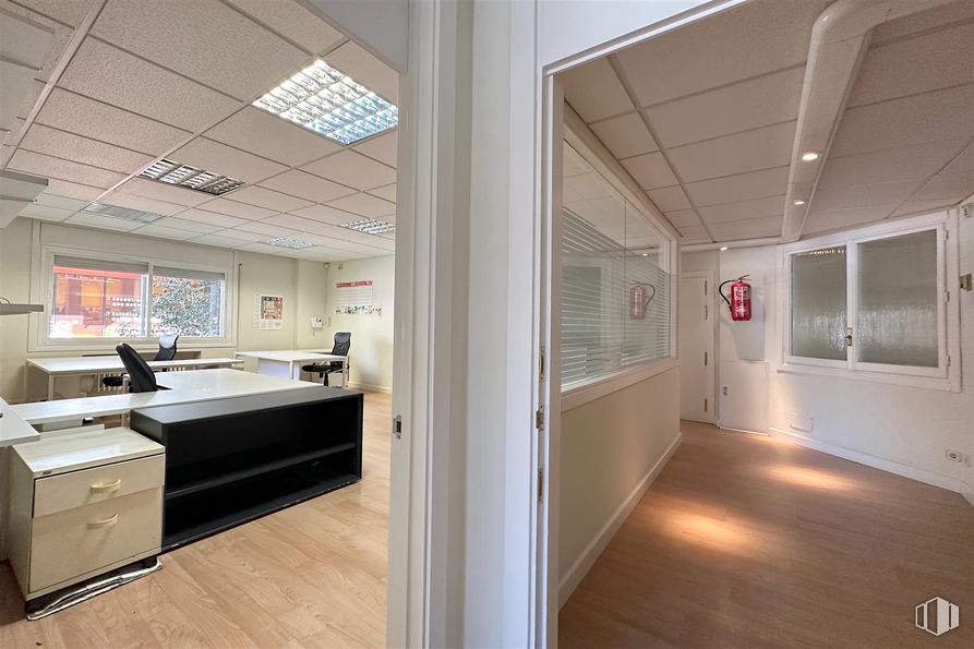 Office for rent at Avenida América, Salamanca, Madrid, 28002 with window, chest of drawers, light fixture, flooring, interior design, floor, ceiling, lighting, composite material and wood flooring around