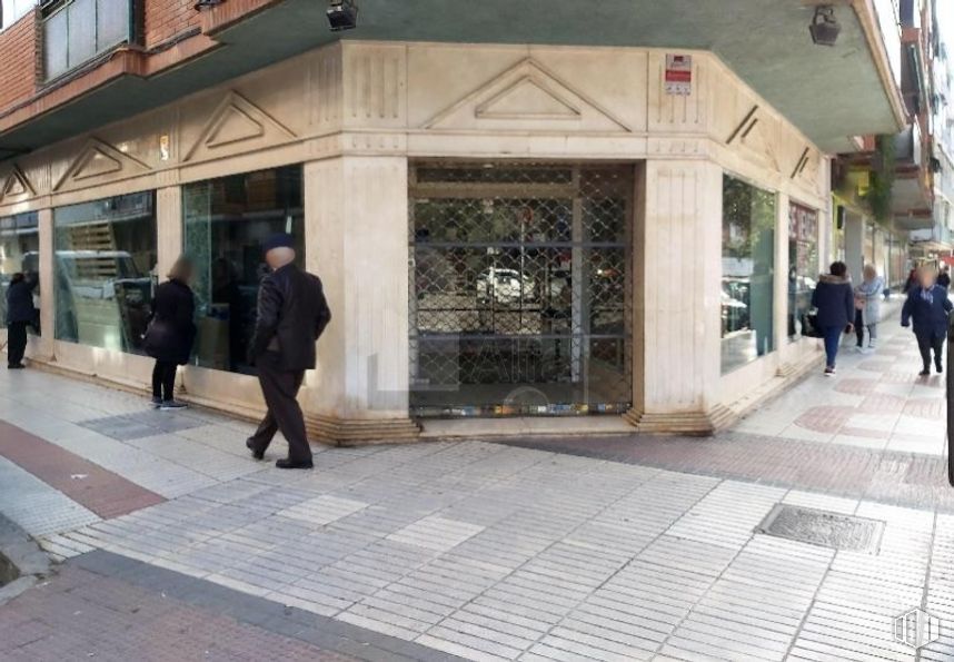 Retail for sale at Calle Lago Erie, Vicálvaro, Madrid, 28032 with person, building, window, door, outerwear, road surface, public space, sidewalk, facade and city around