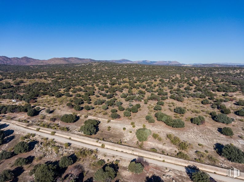 Land for sale at Colmenar del Arroyo, Colmenar del Arroyo, Madrid, 28213 with sky, plant, plant community, ecoregion, mountain, land lot, vegetation, tree, formation and road around