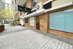 Retail for rent at Calle San Germán, Tetuán, Madrid, 28020 with building, window, road surface, brick, asphalt, tree, wood, sidewalk, brickwork and flooring around