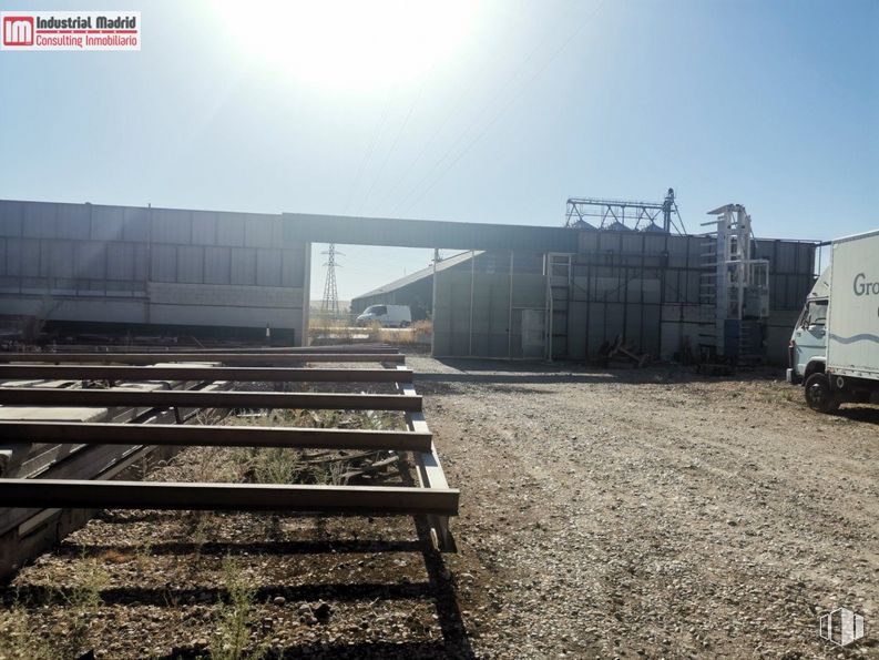 Industrial for sale at Zona Estación, Seseña, Toledo, 45223 with truck, sky, track, sunlight, wood, cloud, asphalt, rolling, landscape and gas around