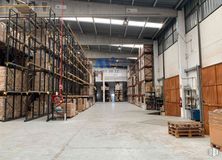 Industrial for rent at Zona Daganzo, Daganzo de Arriba, Madrid, 28814 with building, wood, floor, flooring, engineering, bookcase, shelving, metal, city and beam around