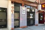 Retail for sale at Plaza San Pedro y San Pablo, 2, Coslada, Madrid, 28820 with fixture, door, building, wood, facade, composite material, gas, city, street and mixed-use around