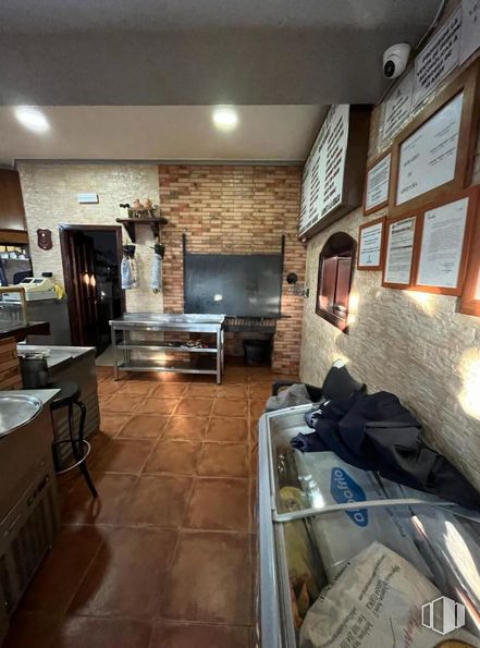 Retail for sale at Carretera Pedroñeras, La Alberca de Záncara, Cuenca, 16620 with television, table, furniture, property, picture frame, building, wood, countertop, lighting and cabinetry around