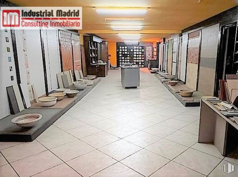 Industrial for sale at Avenida Madrid, Arganda del Rey, Madrid, 28500 with desk, flooring, floor, bookcase, building, retail, eyewear, shelving, shelf and event around