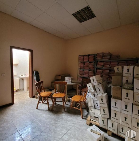 Industrial for sale at Calle Juan de la Cierva, Valdemoro, Madrid, 28341 with chair, packaged goods, furniture, wood, interior design, bookcase, flooring, floor, living room and shelf around