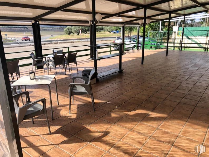 Industrial for sale at Carretera M-300, Torres de la Alameda, Madrid, 28813 with chair, table, building, plant, shade, wood, floor, flooring, leisure and road surface around