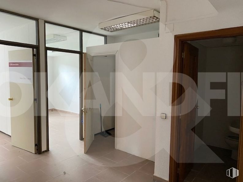 Office for rent at Ronda Buenavista, Toledo, 45005 with lighting, building, fixture, automotive design, interior design, door, floor, architecture, flooring and wood around