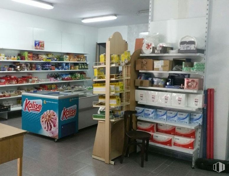 Retail for sale at Calle Pozo Nuevo, Escarabajosa de Cabezas, Segovia, 40291 with chair, packaged goods, furniture, table, shelf, building, shelving, floor, retail and publication around