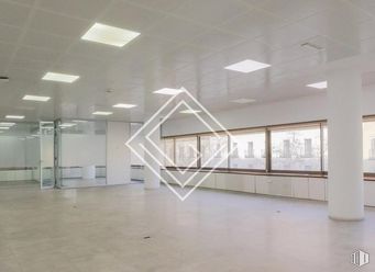 Office for rent at Calle Serrano, 41-45, Salamanca, Madrid, 28001 with light fixture, lighting, flooring, floor, ceiling, interior design, composite material, hall, glass and tile flooring around